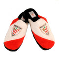 Kids plush house slippers in red white and black with an Athletic Club crest.