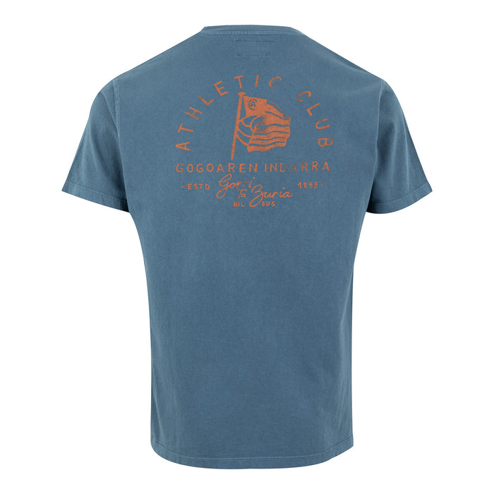Back view of blue AC Collection Tee with an orange flag graphic and club branding.