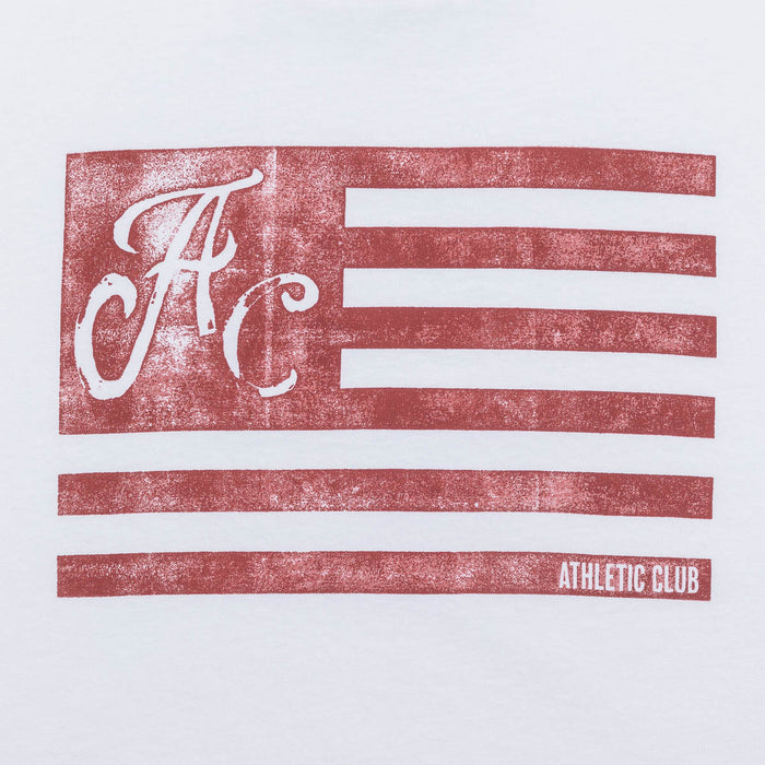 Front view of white AC Collection Tee with a large distressed red flag stripe graphic and AC logo