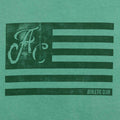 Front view of green Women's AC Collection tee featuring a distressed dark graphic showing AC letters and horizontal stripes