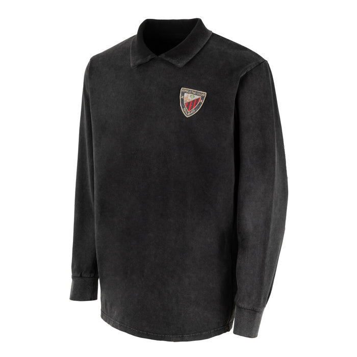 Black long sleeve polo shirt with a crest patch on the chest