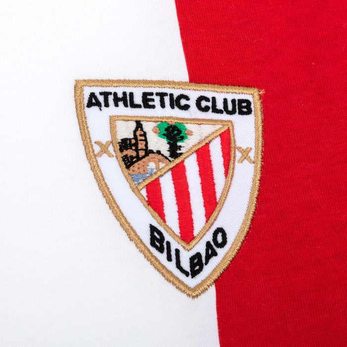 Athletic Club Bilbao crest embroidered on a white and red striped junior jersey