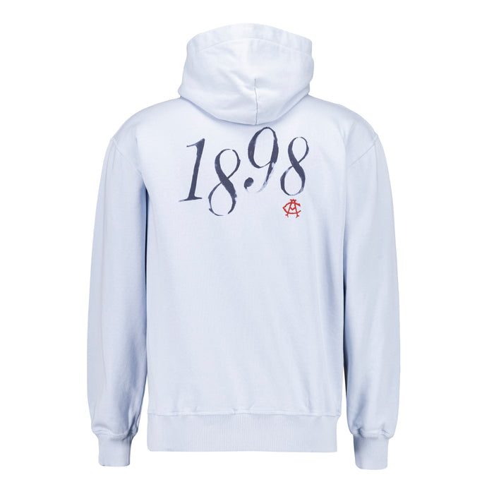 Sudadera celeste vista por la espalda con el 1898 y el escudo Athletic Club