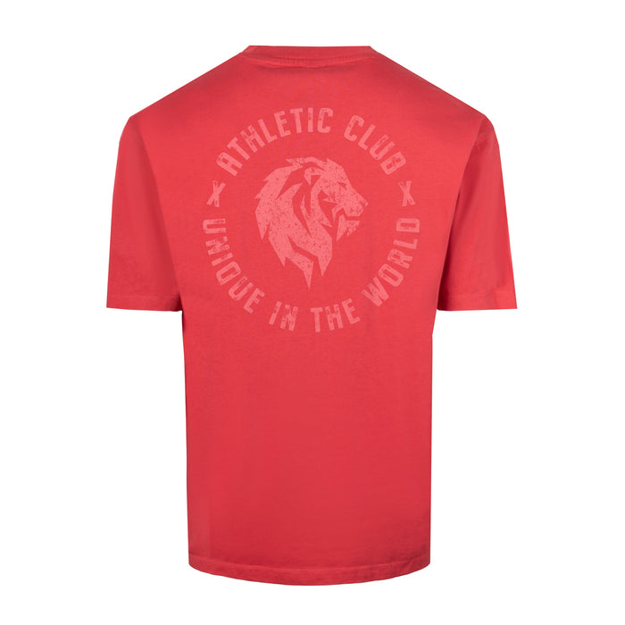 Back view of red T shirt with a large faded circular graphic featuring a lion crest.