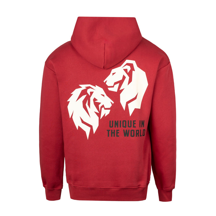 Red hooded sweatshirt with white twin lion graphic on the back and the Unique in the World slogan