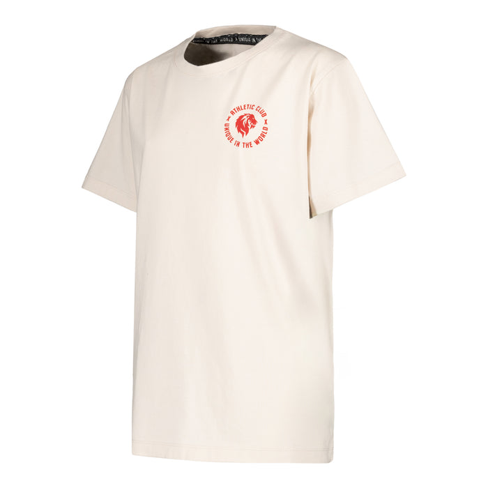 Off white short sleeve youth T shirt with a small red circular logo on the left chest featuring a lion and the words UNIQUE IN THE WORLD