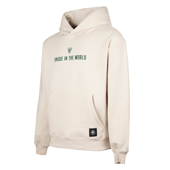 Beige hoodie front with a green crest and Unique in the World lettering on the chest