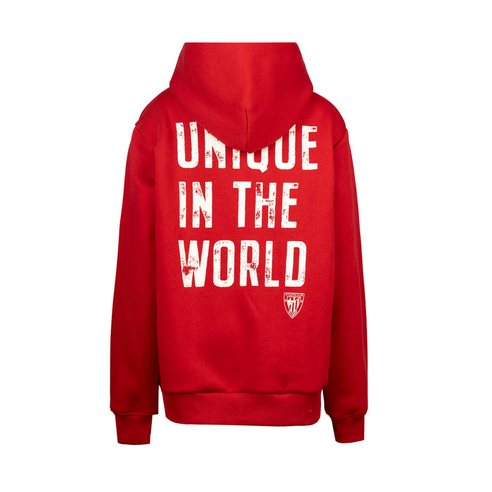 Red hoodie back view with bold white UNIQUE IN THE WORLD text and a small crest near the hem