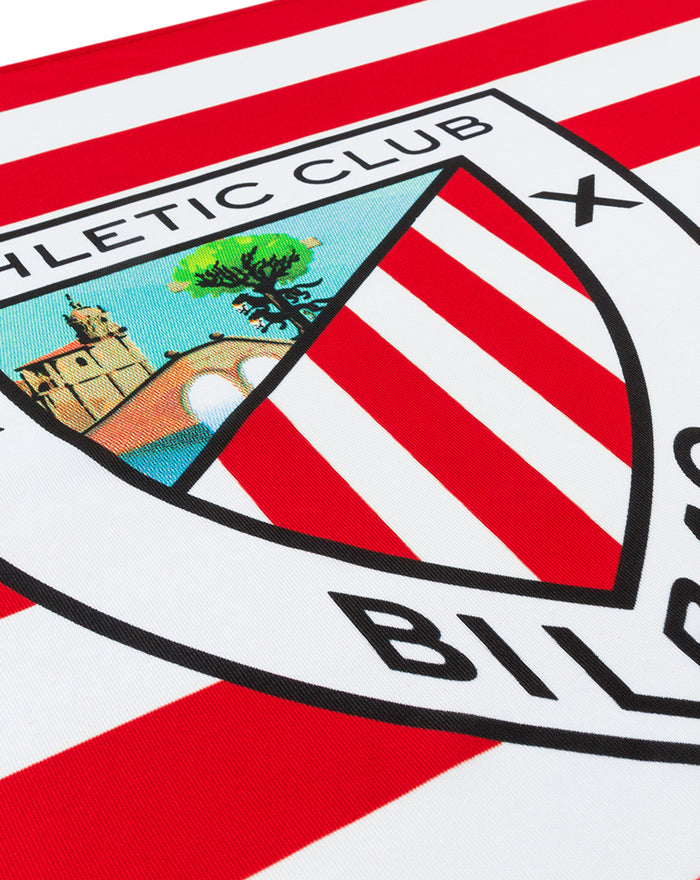 Official Athletic Club Bilbao flag with red and white stripes and crest close up.