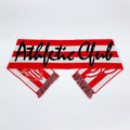 Athletic Club scarf with bold red and white stripes, fringe ends and crest patch.