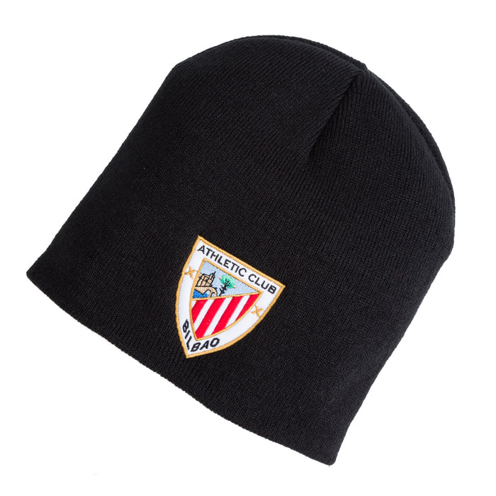Black knitted beanie with an embroidered shield crest patch