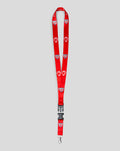 Red lanyard featuring club crests and a lion emblem with metal buckle clip