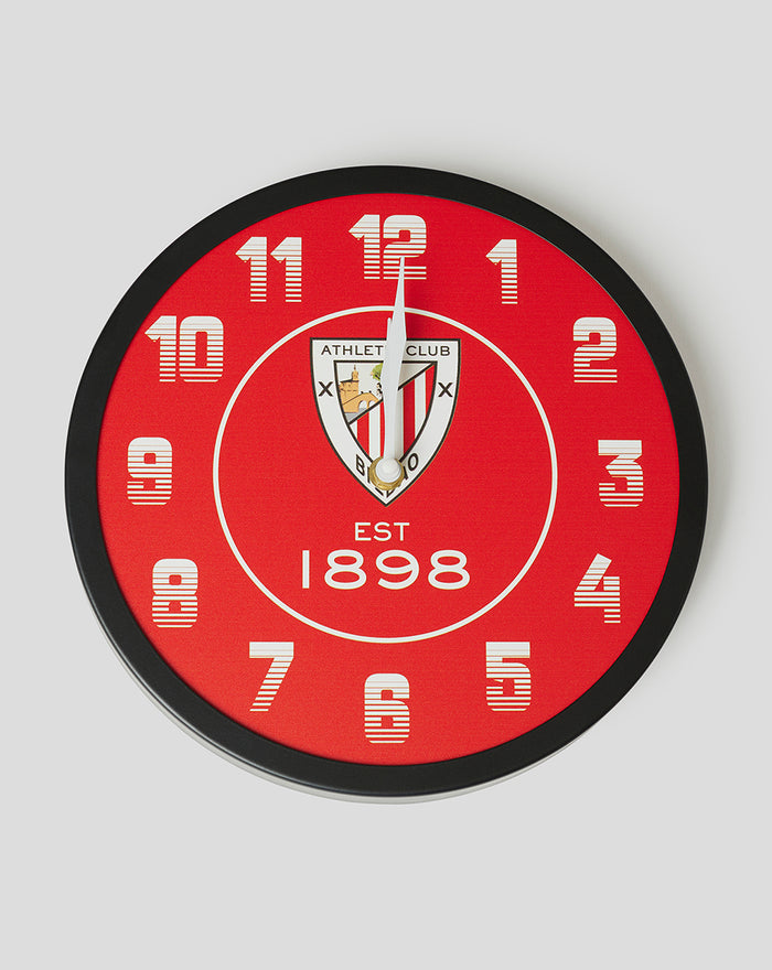 Red round metal clock with white numerals and the Athletic Club Bilbao crest at the center