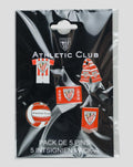 Pack of five Athletic Club enamel pins with crest designs on a black package