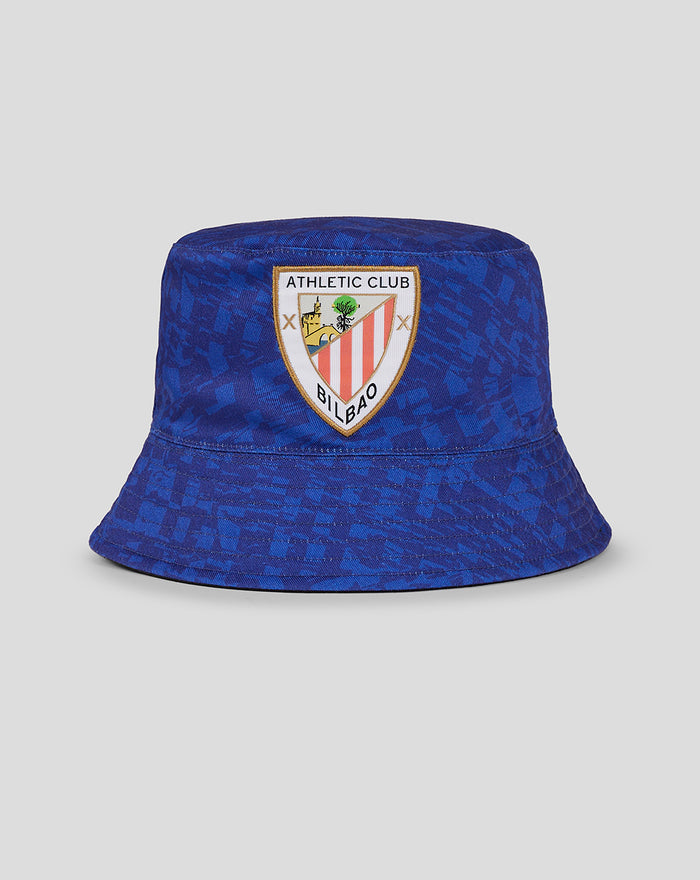 Blue reversible bucket hat with Athletic Club Bilbao crest on the front