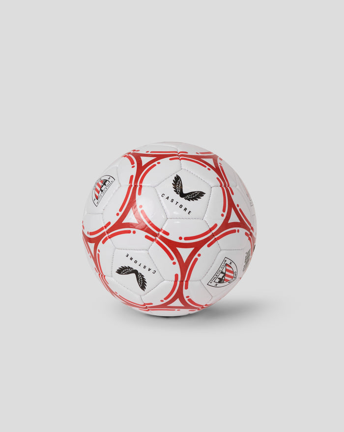 Close up of a mini football size 1 from Athletic Club with white panels and bold red graphics