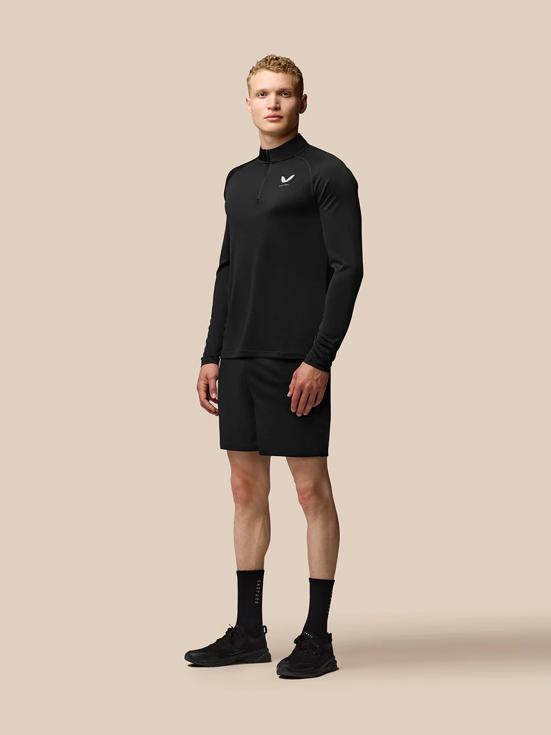 Adaptar el entrenamiento 1/4 zip top - negro
