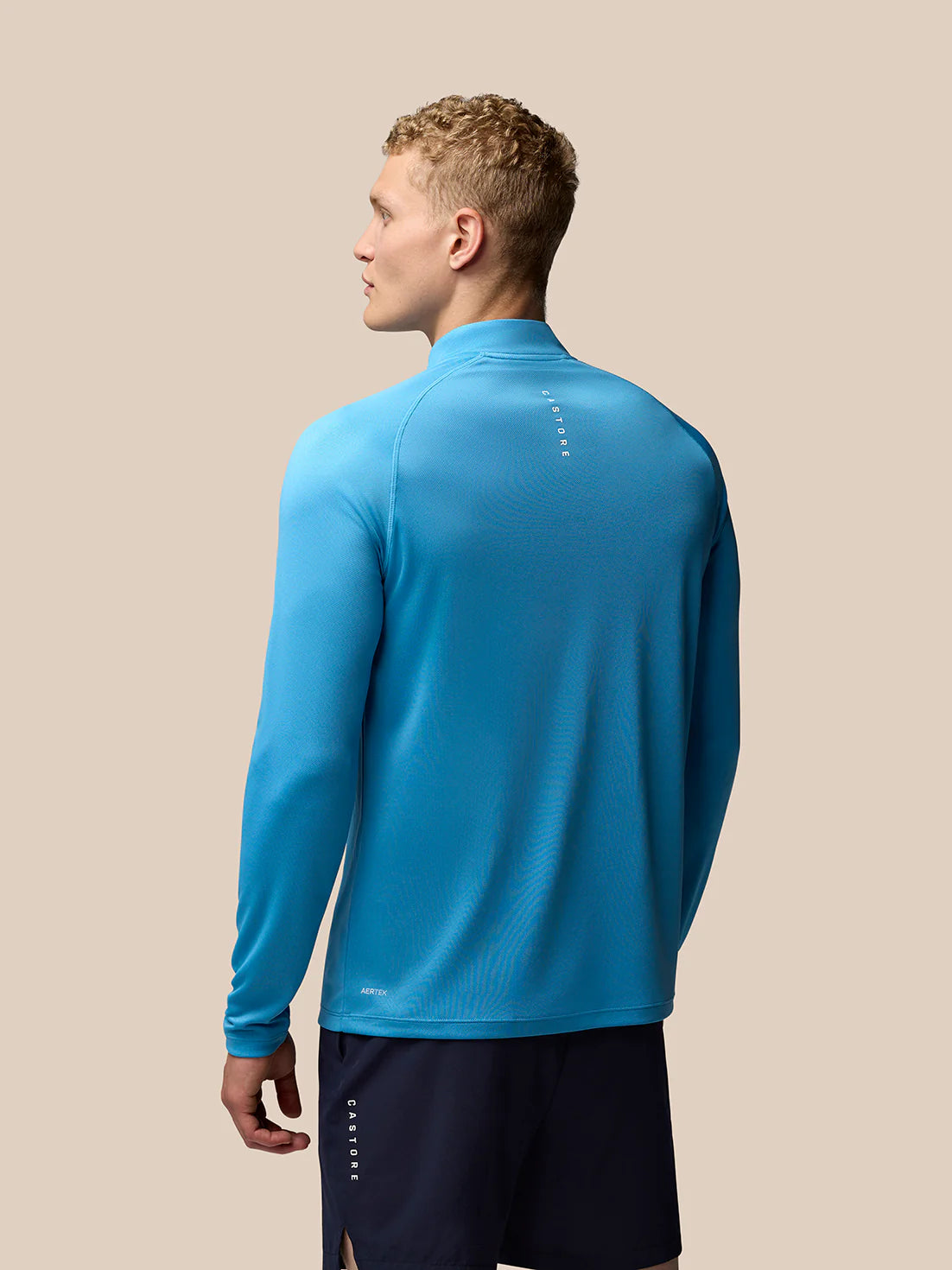 Adapte el entrenamiento 1/4 zip top - azul de maíz