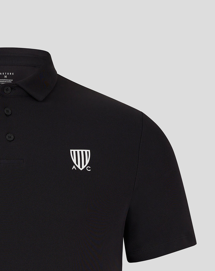 Front view of black Club Essential SS Polo with white crest on chest and button placket