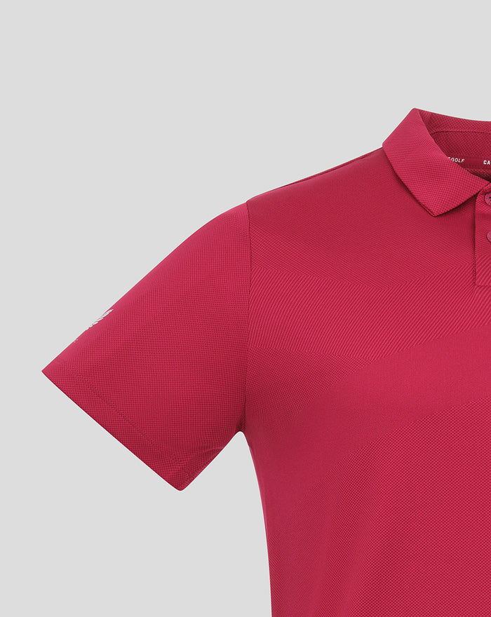 Close-up of red Pinnacle Engineered Knit Polo shoulder and collar showing a textured knit pattern.