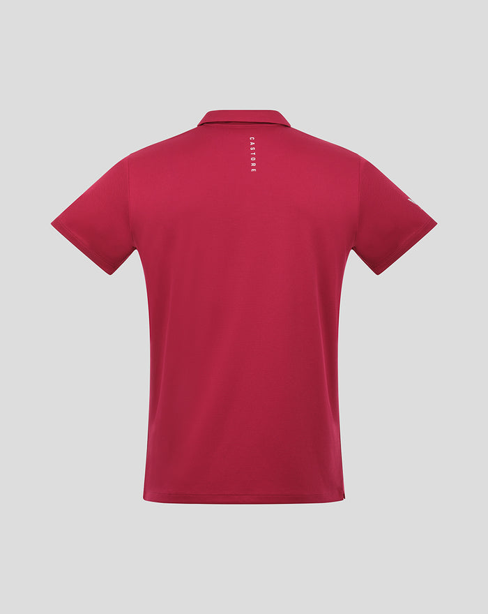 Back view of red Pinnacle Engineered Knit Polo with vertical Castore branding along the back neckline.