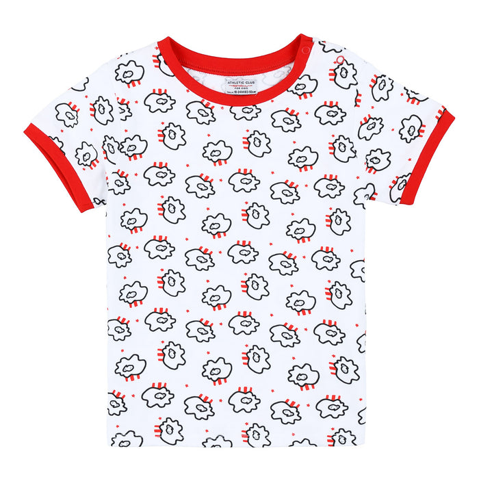 White children's T shirt with red trim on neck and sleeves and a repeating black outlined cloud pattern