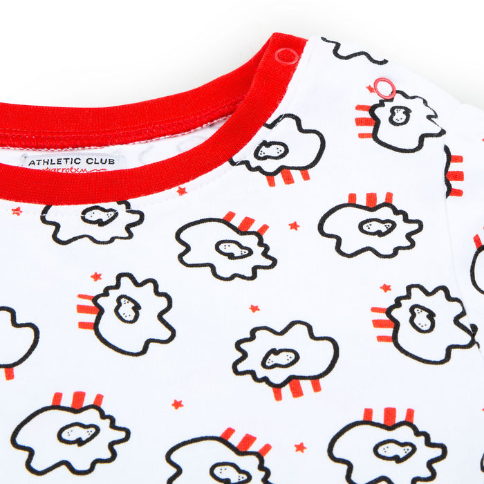 Close-up of red crew neck and inner label on white tee with ATHLETIC CLUB visible.