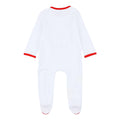 Back view of a white footed baby romper with red trim at neckline and cuffs.
