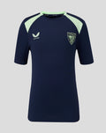 Navy short sleeve performance tee with mint shoulder panels and a chest crest on a light background.