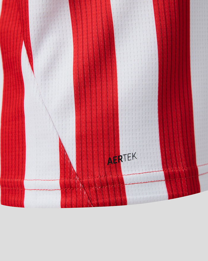 Close-up of red and white striped junior Home shirt fabric with AERTEK text