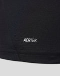 Close up of the jersey hem with AERTEK branding on black fabric