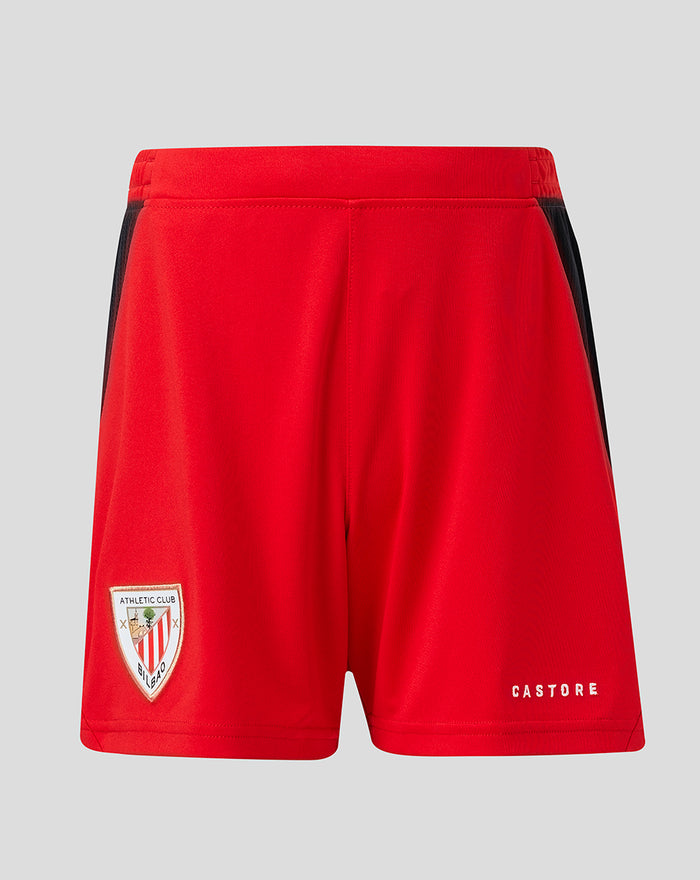 Back view of red junior shorts with a team shield badge on the left leg and CASTORE branding on the right hem