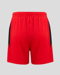 Rear view of red junior shorts with black mesh side panels and CASTORE branding at the hem