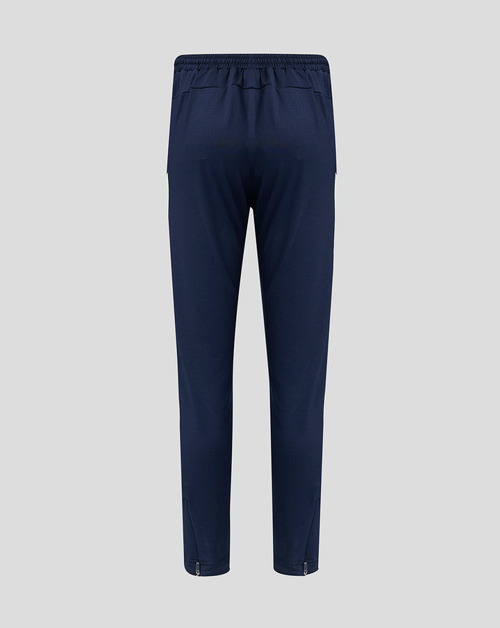 Back view of navy performance pants with elastic waistband and subtle paneling