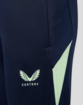 Junior navy performance pants with pockets, mint side panel and Castore logo
