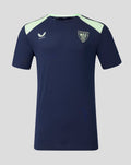 Front view of navy performance short sleeve tee with mint shoulder panels, Castore logo on the chest and the club crest