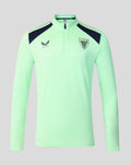 Neon green performance midlayer top with navy shoulder panels and crest emblem on the chest