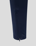 Navy performance pant leg with visible ankle zipper