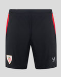 Back view of black Home shorts with red side panels and Athletic Club crest on the left leg and Castore logo on the right.