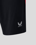 Black Home shorts with the Castore logo printed on the hem.