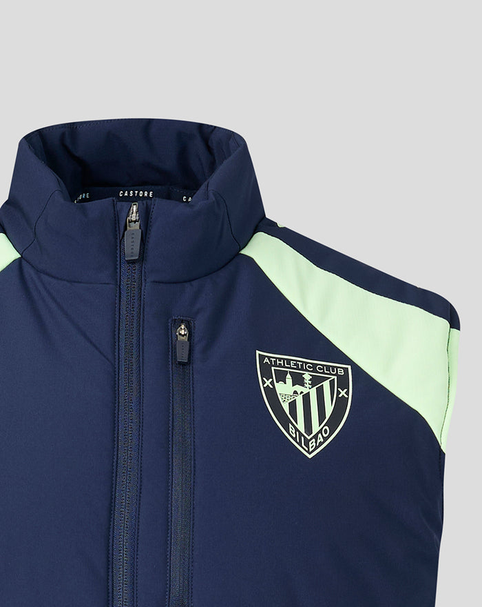 Navy performance gilet with mint shoulder panels and a left chest crest.