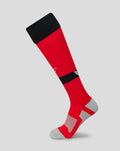 Red adult soccer sock with black cuff and gray reinforced toe and heel