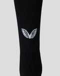 Close up of a black junior goalkeeper sock with a white wing emblem