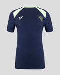 Front view of navy performance short sleeve tee with mint shoulder panels and club crest.