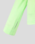 Close up of neon green performance midlayer sleeve with a small vent slit