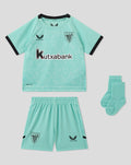 Turquoise Athletic Club 3rd Baby Kit laid flat showing shirt shorts and socks with crest and Kutxabank sponsor.