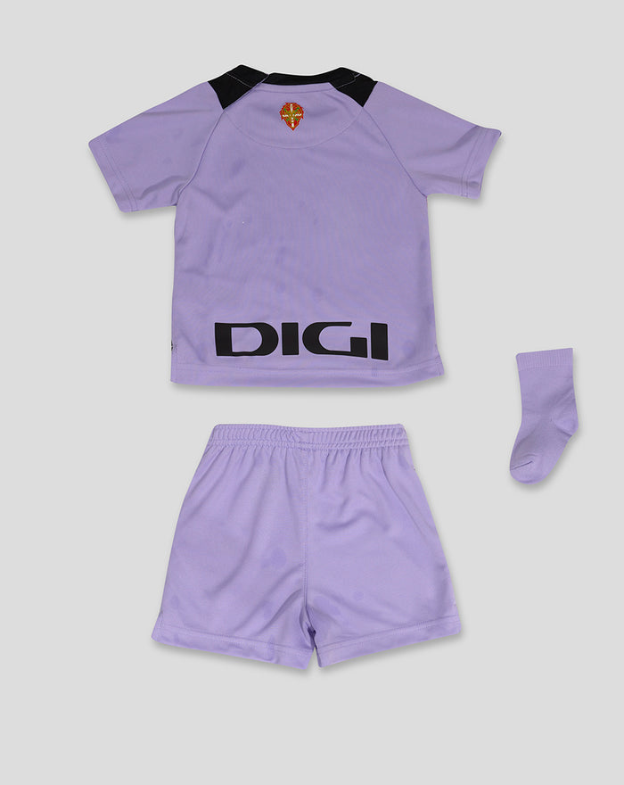 Lavender baby kit featuring a short sleeve tee with black shoulder panels, matching shorts, and a single sock.