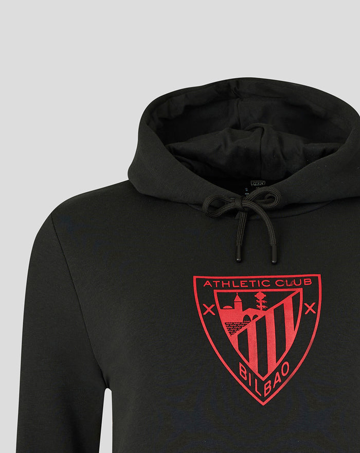Close up of a black Athletic Club hoodie featuring a red crest on the chest and a drawstring hood