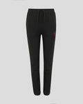 Black athletic joggers with a red crest on the thigh and a drawstring waistband