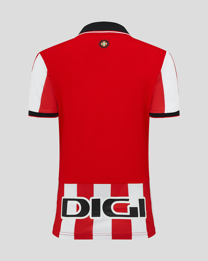 Back view of the Athletic Club home shirt in red with white sleeves and black cuff trim, featuring bold lettering across the lower back.